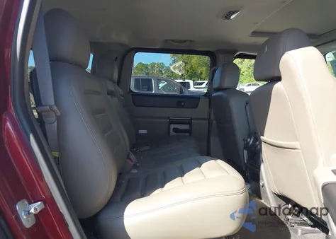 2003 Hummer H2 z USA, uszkodzony, nr VIN 5GRGN23U03H139480